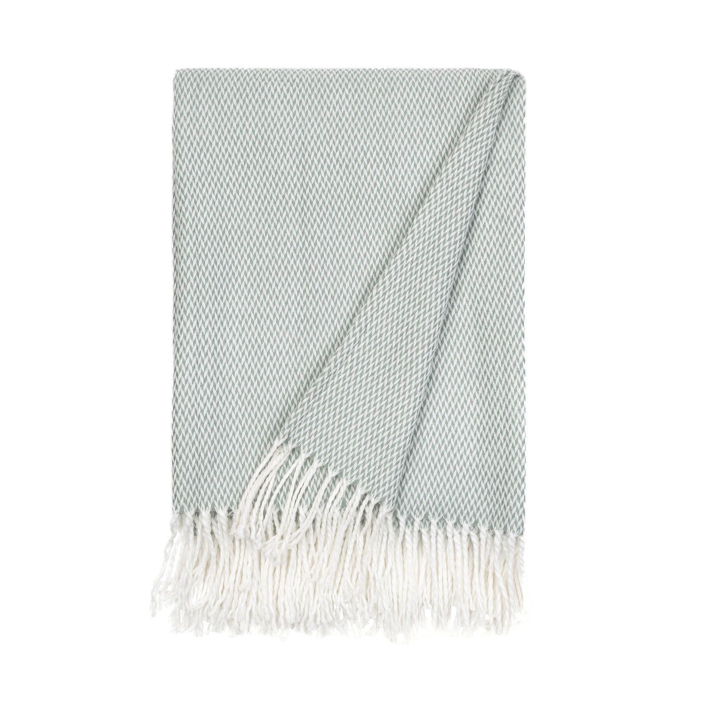 light eucalyptus green and white woven blanket in a herringbone pattern with white fringe on a white background